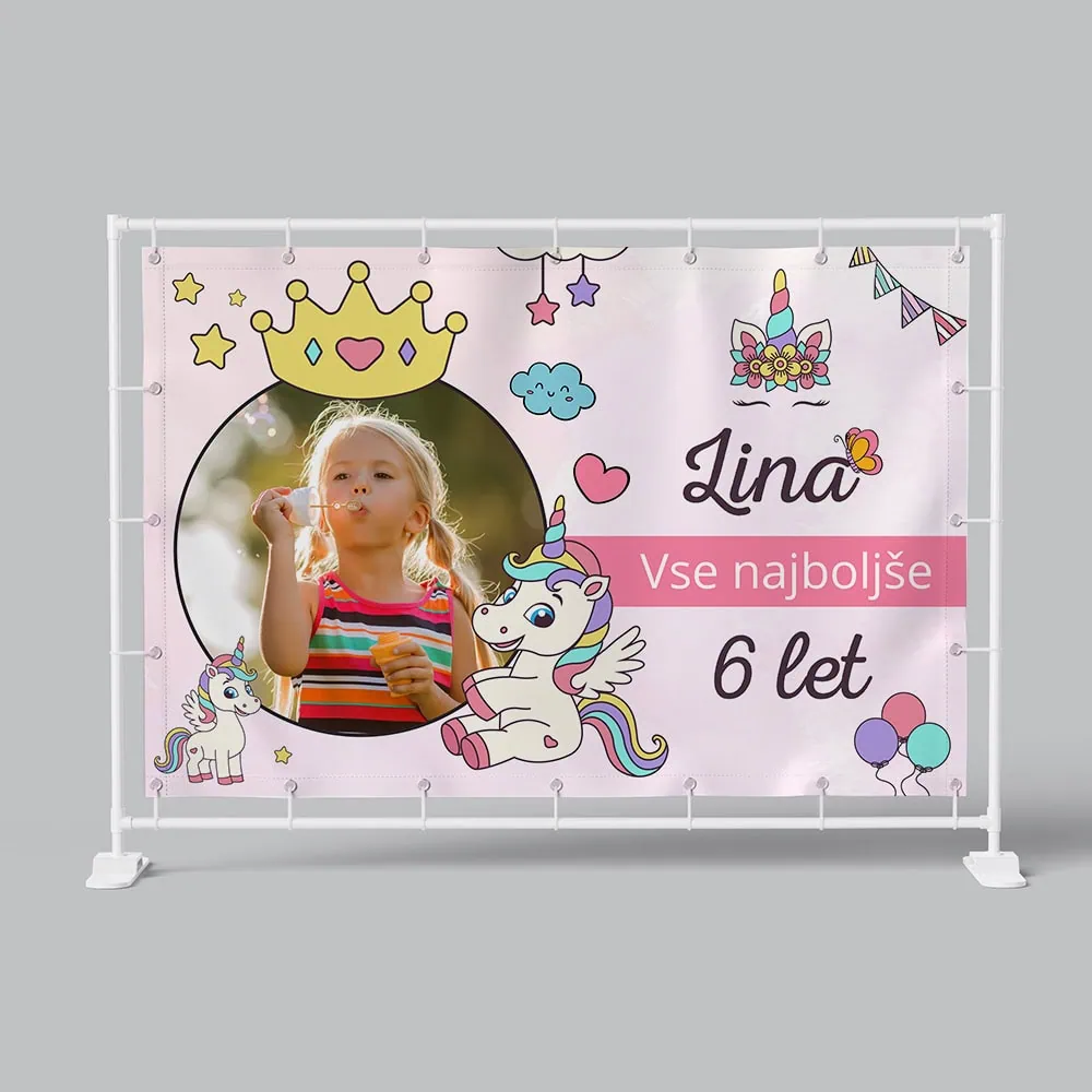 Personalized children's birthday banner with unicorn and colorful decorations.