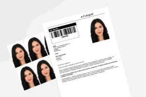 A woman with long dark hair holding a passport and travel documents, smiling at the camera.