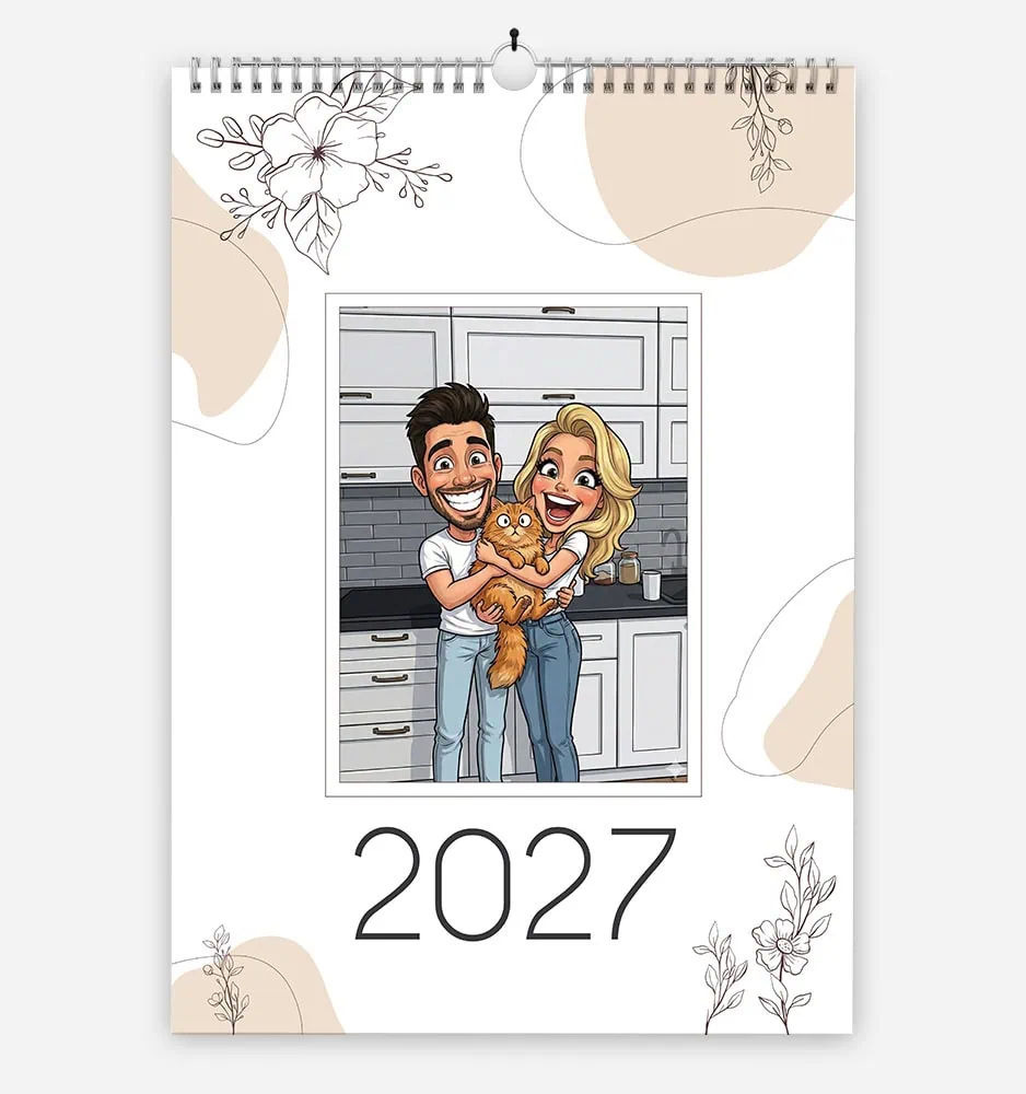 Happy couple with a cat on a 2027 calendar in a modern kitchen.