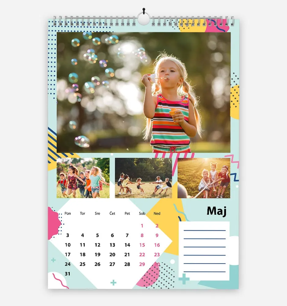 razigrana_3 Colorful calendar with a young girl blowing bubbles outdoors in sunlight.