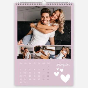 Happy couple embracing in a modern kitchen for August calendar page.