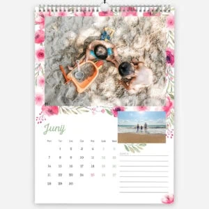 Children playing on the beach with a sandcastle and a small photo of a family at the beach.