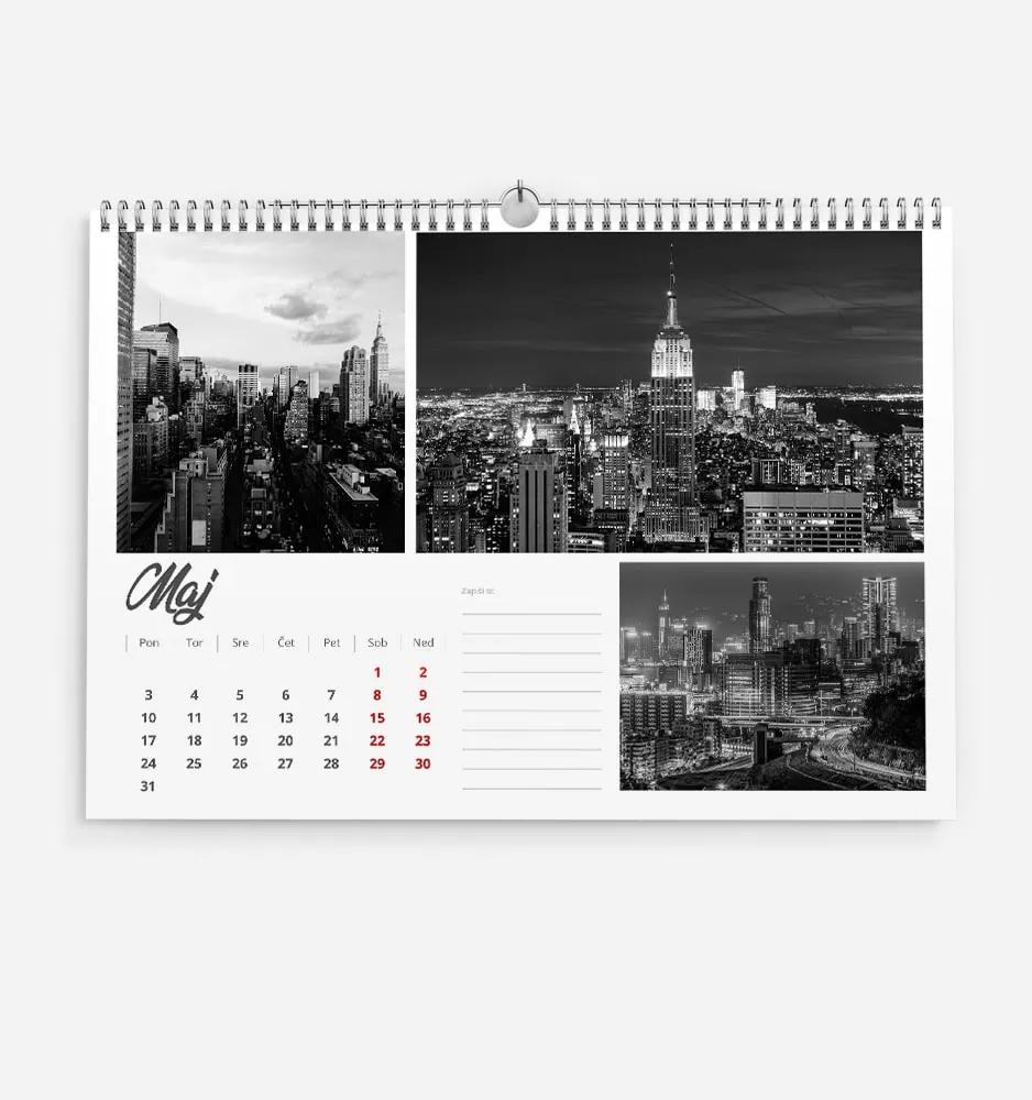 Black and white cityscape calendar featuring New York City skyline with Empire State Building.