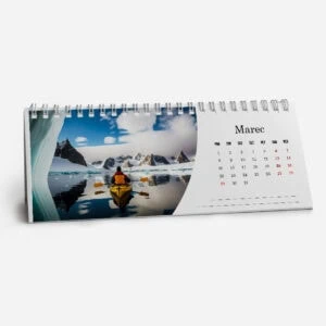 Desk calendar with a scenic mountain and lake photograph for March.