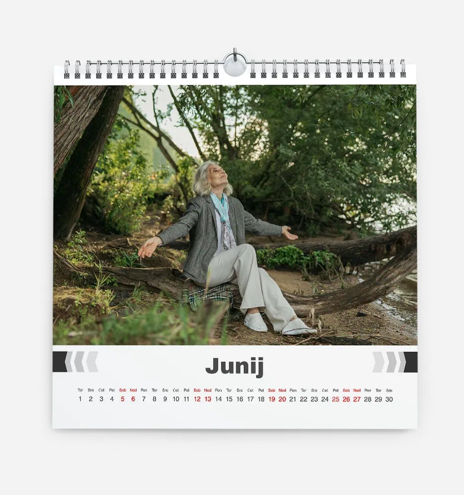 vecna_klasika_k_6 Serene elderly woman meditating outdoors in a lush green forest in June.
