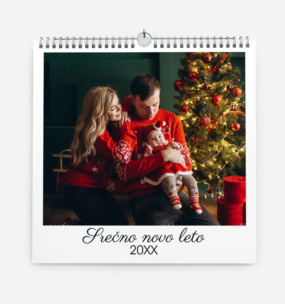 Family celebrating Christmas with a decorated tree and gifts in a cozy setting.