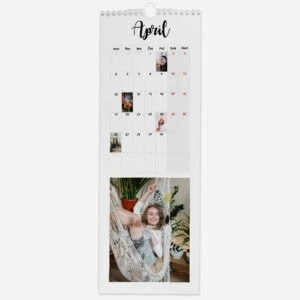 April calendar with photos and a smiling girl relaxing in a hammock.